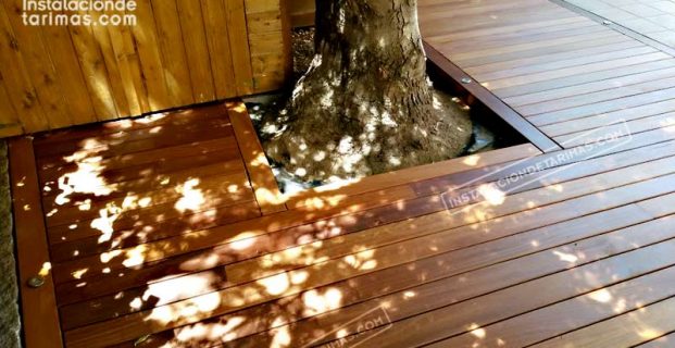 Fotos de tarima exterior de cumarú rojo con cetol color roble.